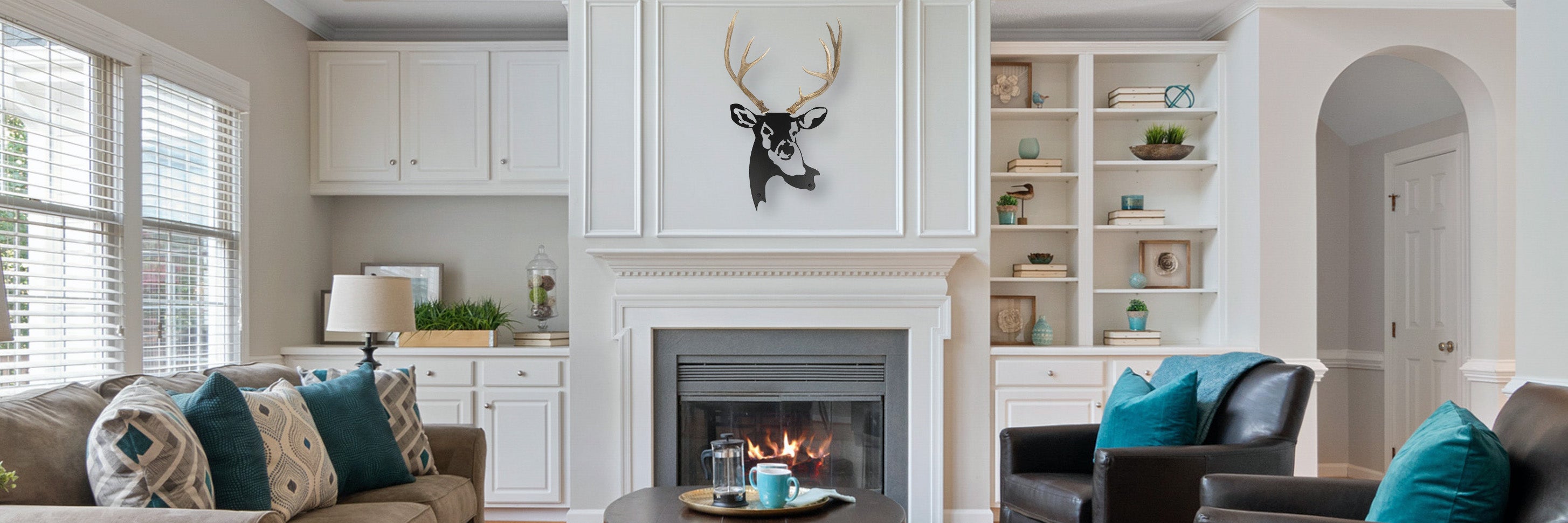 A image of an antler & metal wall decor by Dekor Nature in a living room above a fireplace