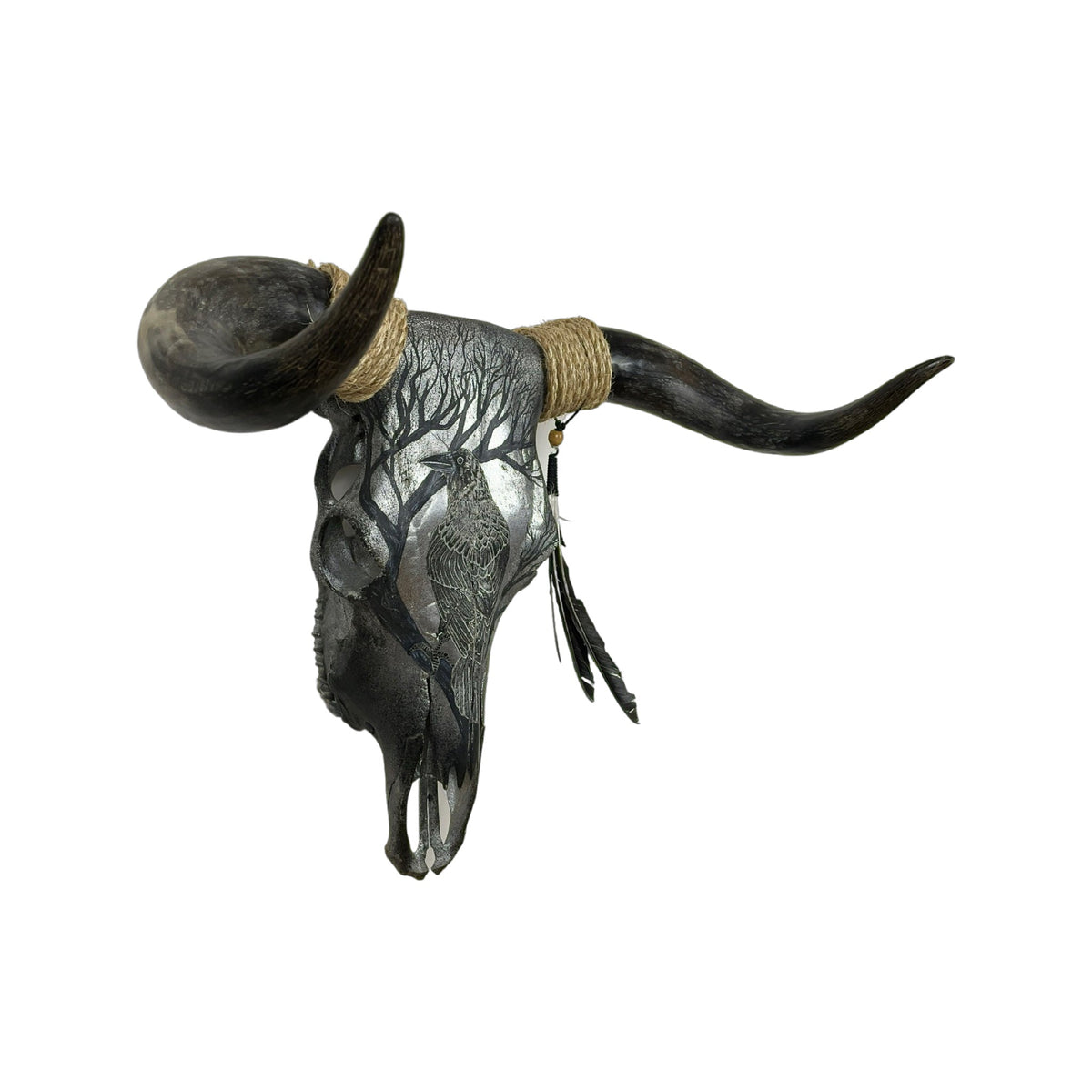 A Bull Engraved Skull Taxidermy Wall Decor featuring a crow perched on a tree