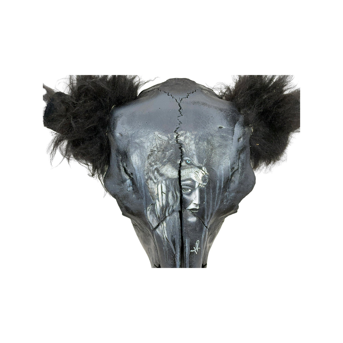 A Longhorn Engraved Skull Taxidermy Wall Decor featuring a wolf and a woman's face