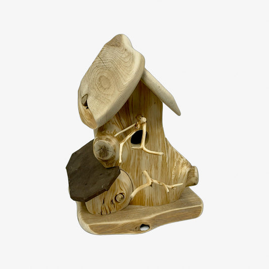 A hand made Birdhouse made from Cedar Wood