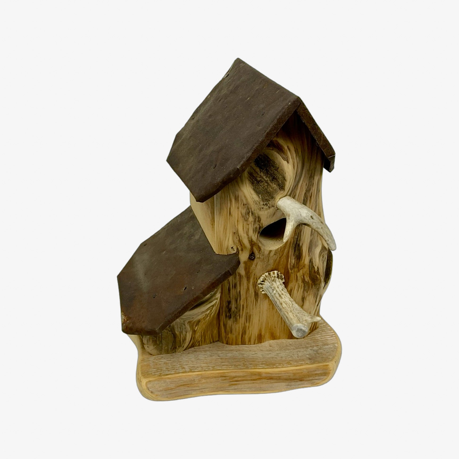 A hand made Birdhouse made from Cedar Wood
