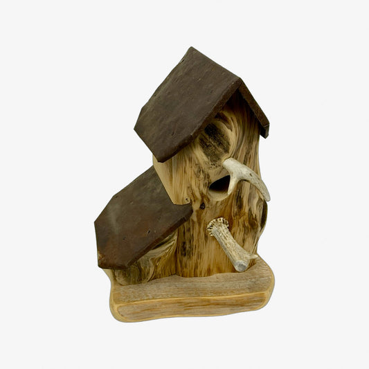 A hand made Birdhouse made from Cedar Wood