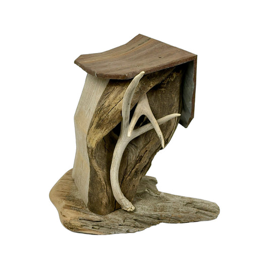 A hand made Birdhouse made from Driftwood