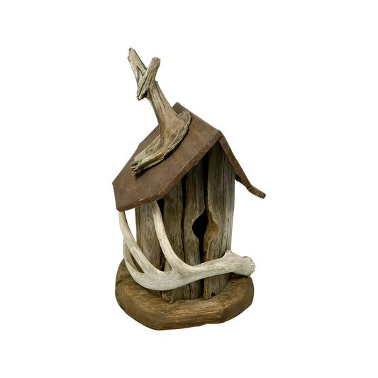 A hand made Birdhouse made from Driftwood