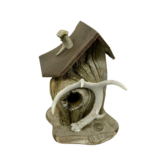 A hand made Birdhouse made from Driftwood