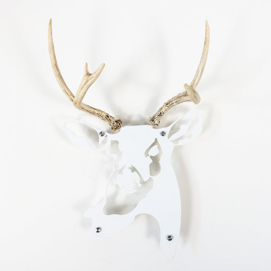 A metal wall decor made from real ethically sourced  White-Tailed Deer antlers mounted on a metal head