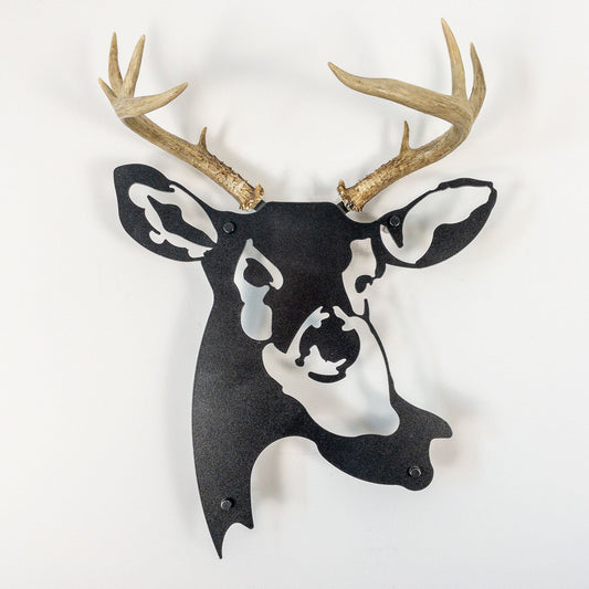 A metal wall decor made from real ethically sourced  White-Tailed Deer antlers mounted on a metal head