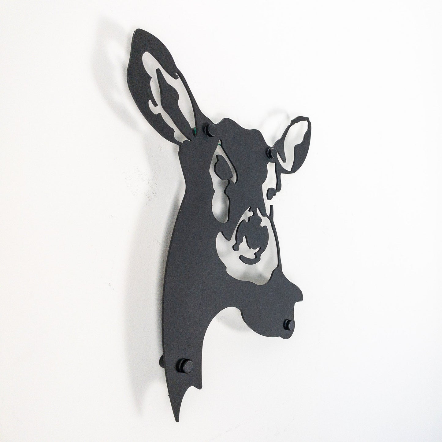 A metal wall decor White-Tailed Deer metal head