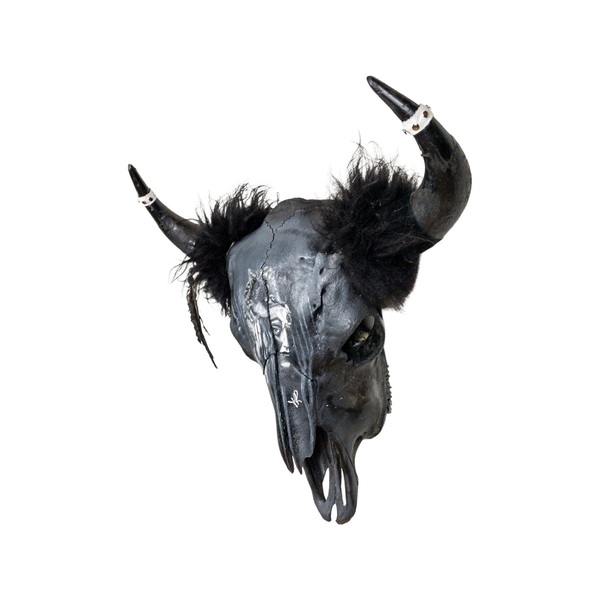 A Longhorn Engraved Skull Taxidermy Wall Decor featuring a wolf and a woman's face