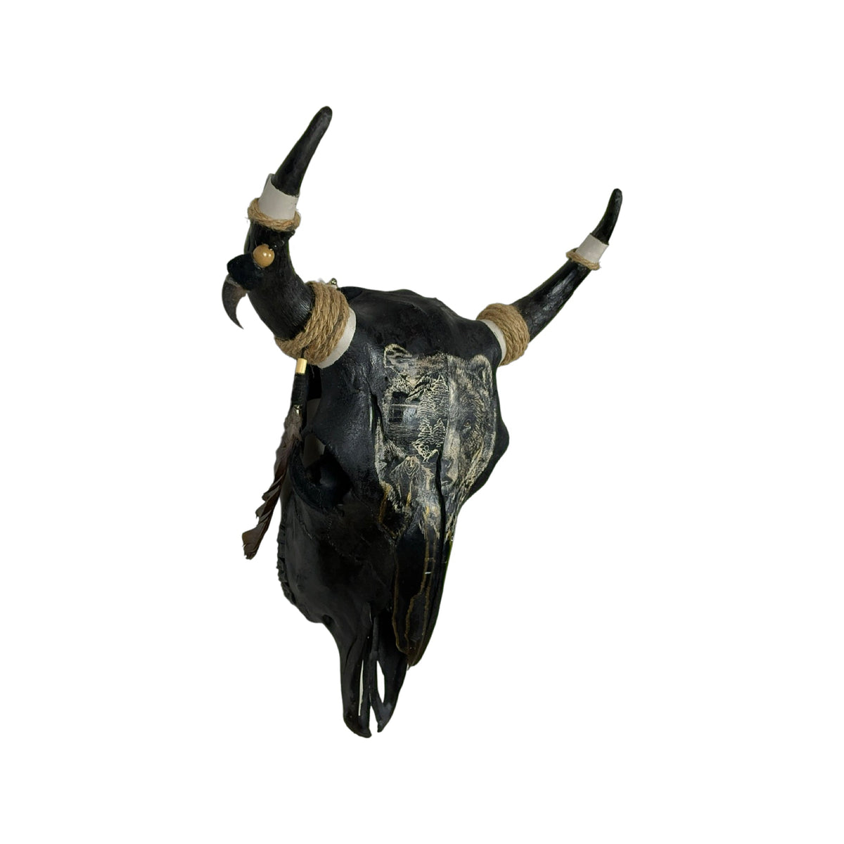 A Young Bull Engraved Skull Taxidermy Wall Decor featuring a bear head and a landscape
