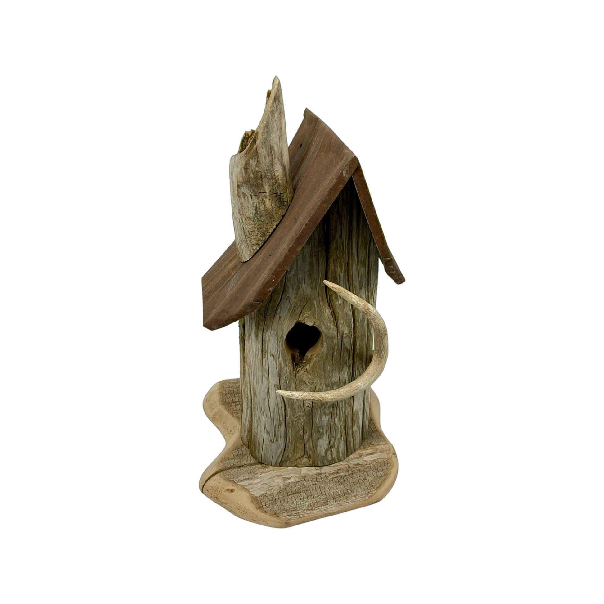 A hand made Birdhouse made from Driftwood