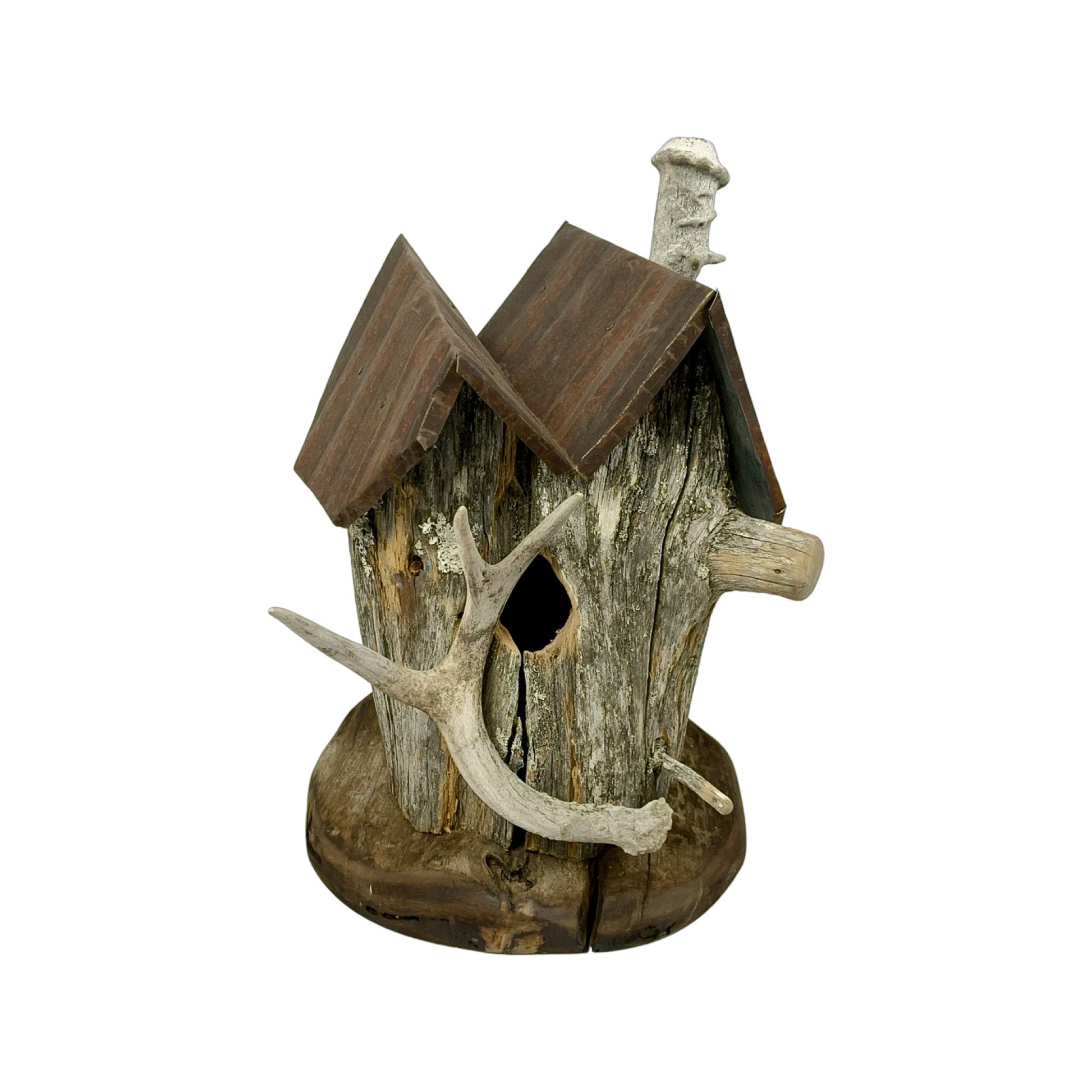A hand made Birdhouse made from Driftwood